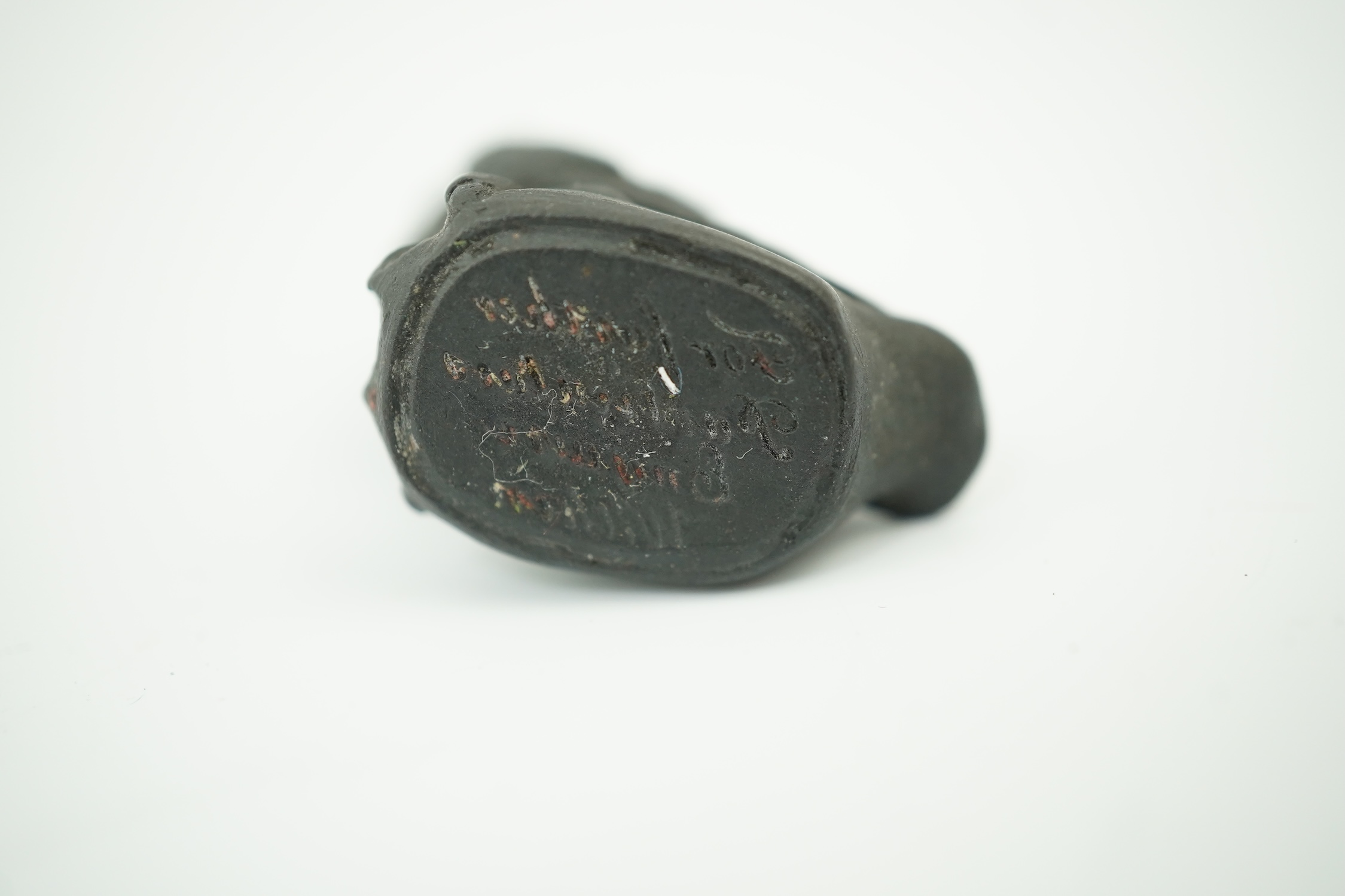 Attributed to Wedgwood, a black basalt intaglio fob seal, c.1809, modelled as an owl, inscribed ‘For further Particulars Enquire Within, 3.5cm high. Condition - good